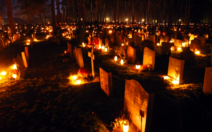 Lanterns at cemetery graves for all saints day and all souls day