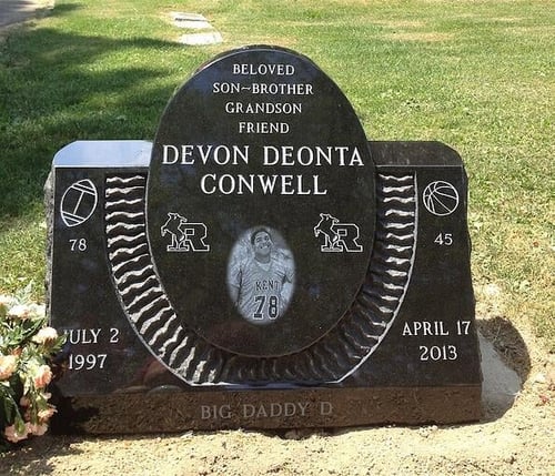football themed headstone for athlete
