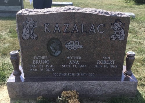 upright husband and wife headstone with vases