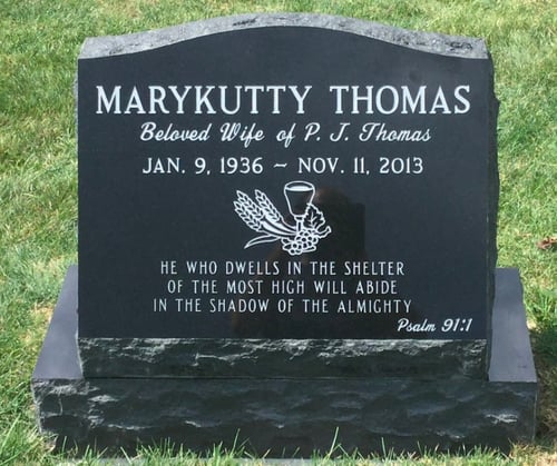 upright headstone with religious quote
